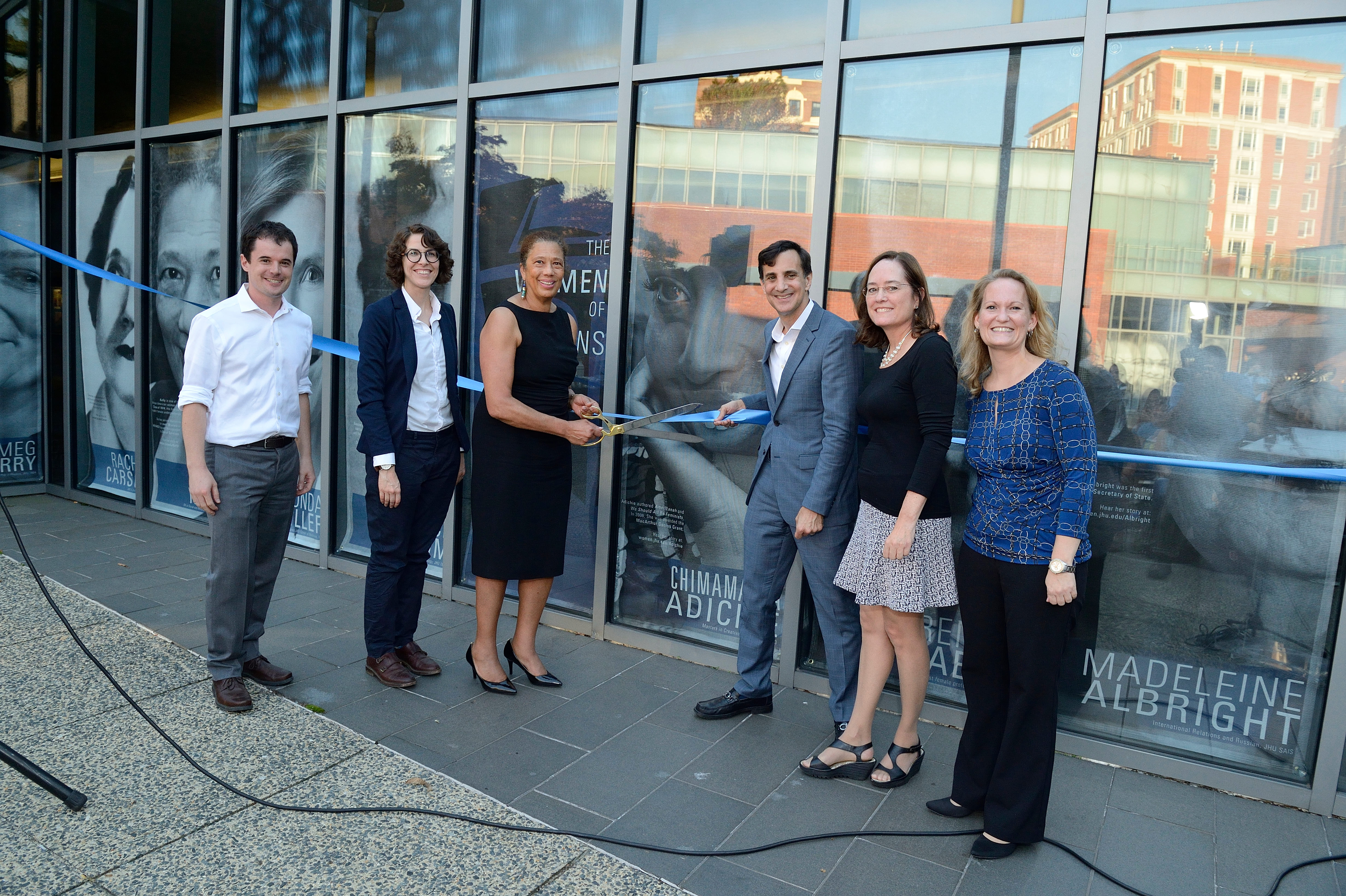 Pictured, (Left to Right), all of Johns Hopkins University: Dominic Scalise, graduate student in chemical and biomolecular engineering and Women's of Hopkins Exhibit team member; Erin Gleeson,  Project and Events Specialist, Office of Institutional Equity; Gail Kelly, one of the Women of Hopkins; Ron Daniels, President; Karen Fleming; and Jeannine Heynes, Director, Office of Gender Equity.*  Photo Credit: Will Kirk, homewoodphoto.jhu.edu