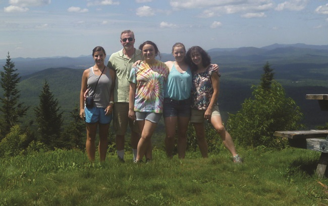 Family picture from right – daughter Cassandra, husband Walter Zurawsky, daughters Alyssa and Catherine, and Scarlata.